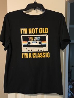SHEIN Black Short Sleeve Tee with Yellow Retro 1985 Cassette Graphic